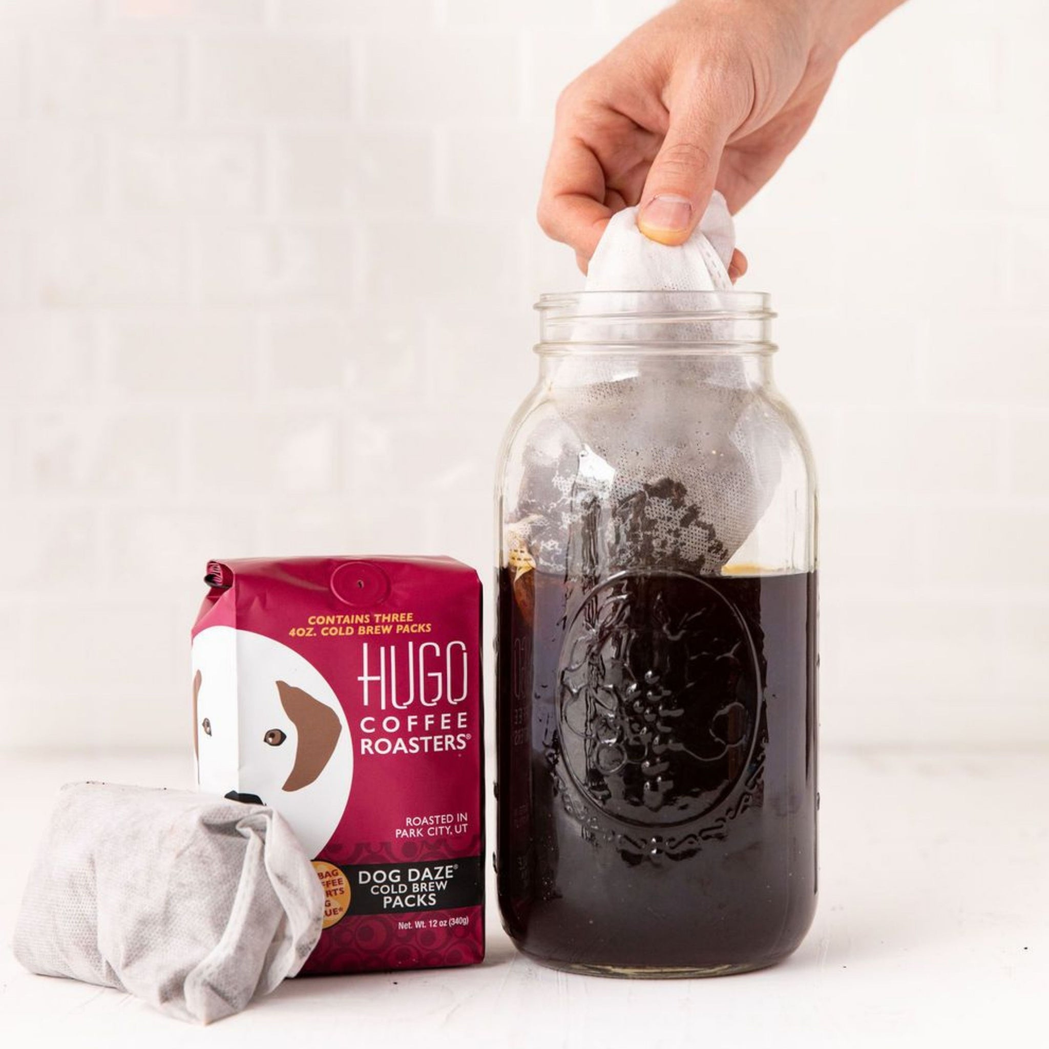 https://shop.hugo.coffee/cdn/shop/products/Hugo-Coffee-Roasters-Dog-Daze-Cold-Brew-Packs-jar_1024x1024@2x.jpg?v=1696885259